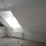 finished plastered room with angled walls
