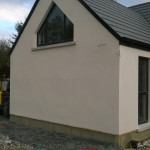 House extension with cream walls and blue slate