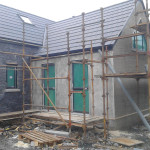 House extension with scaffolding